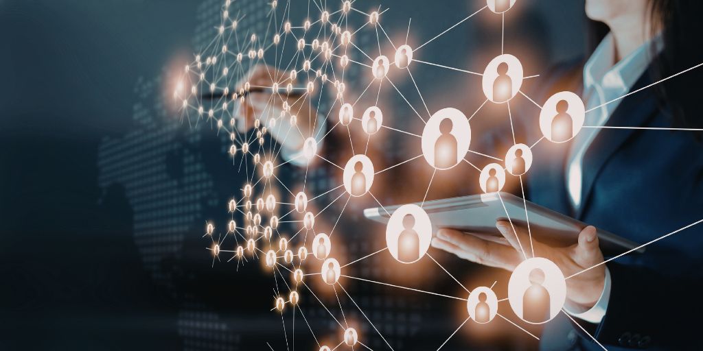 Representación conceptual de una red digital de usuarios y organizaciones conectadas para el intercambio seguro de información a través de plataformas tecnológicas.